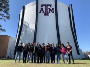 South San Antonio Group Picture in front of the A&M nuclear reactor